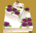 tort weselny z sercem fioletowe kwiaty