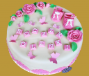 tort na roczek z różowymi dodatkami