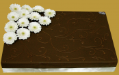 tort weselny w stylu amerykański w ciemnej czekoladzie z żywymi gerberami