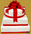 tort weselny w stylu angielskim 3 piętrowy pikowany, czerwona kokarda