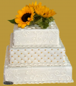 tort weselny w stylu angielskim kwadratowy ze słonecznikami