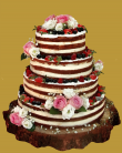 tort weselny w stylu rustyklanym na korze 4 piętrowy różowa róża.jpg