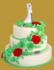 tort weselny w stylu angielskim w białej plastycznej czekoladzie z zielonymi różami